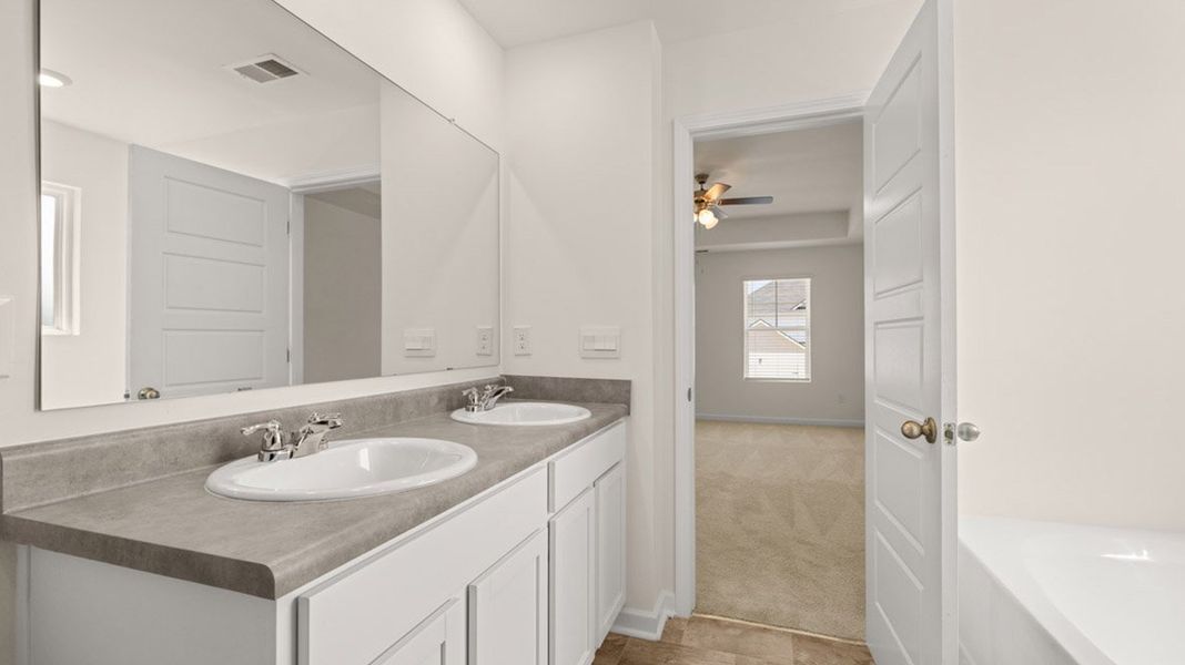 Representative furnished interior of a home built from the Vivian by D.R. Horton in The Preserve at Agricultural Village, Perry (Image 12). Representative furnished interior of a home built from the Vivian by D.R. Horton in The Preserve at Agricultural Village, Perry (Image 12).