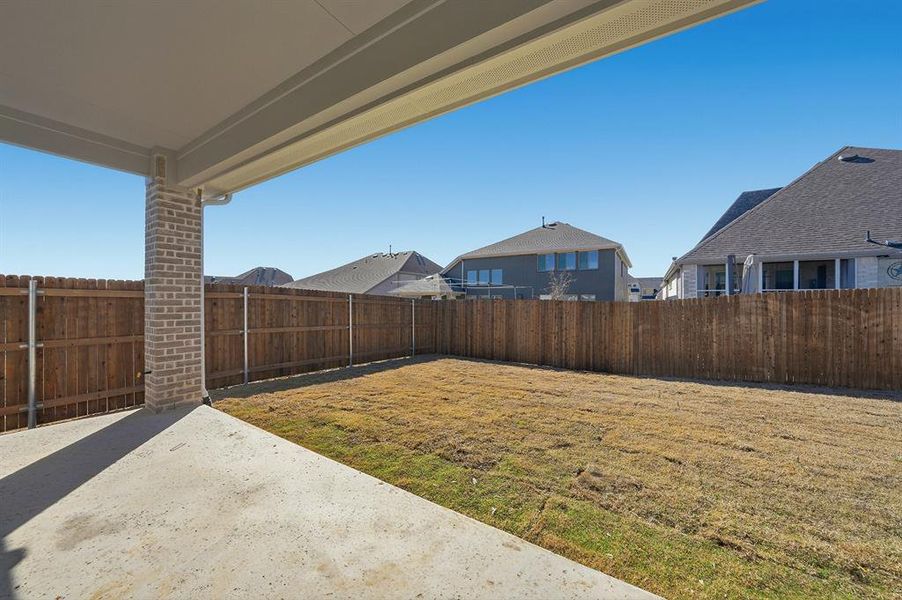 Exterior details and patio area of a home in Tavolo Park, Fort Worth (Image 3).