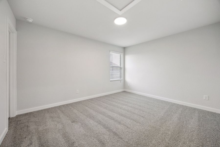 Bedroom in the Haylee home plan by Trophy Signature Homes - REPRESENTATIVE PHOTO Bedroom in the Haylee home plan by Trophy Signature Homes - REPRESENTATIVE PHOTO