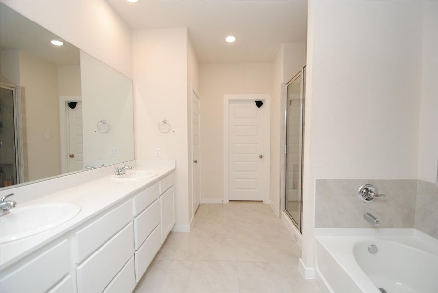 Furnished interior view inside a new home in Mason Woods, Cypress (Image 13).