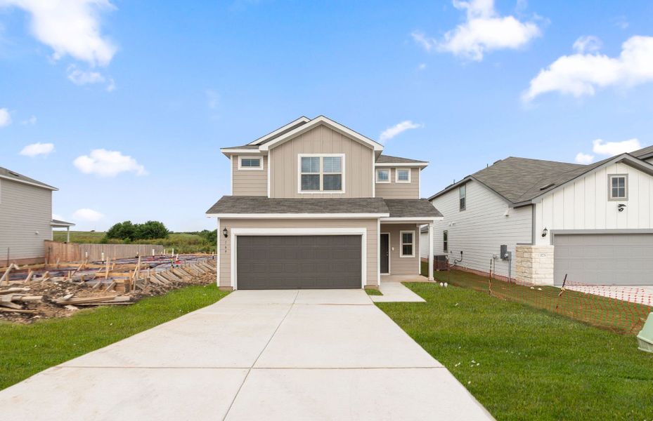 Front exterior of a new home in Sonterra, Jarrell, TX, highlighting curb appeal (Image 20). Front exterior of a new home in Sonterra, Jarrell, TX, highlighting curb appeal (Image 20).