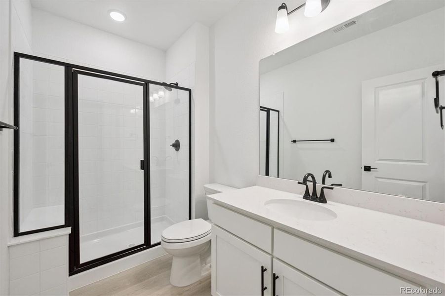 Furnished interior view inside a new home in The Aurora Highlands, Aurora (Image 8).