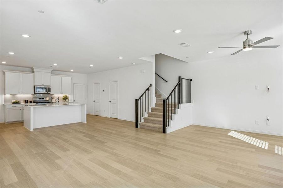 Featuring a delightful open concept design, our Tatum plan was designed for entertaining!