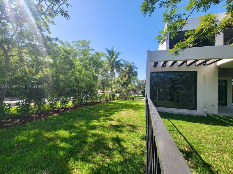 Front exterior of a new home in , South Miami, FL, highlighting curb appeal (Image 25). Front exterior of a new home in , South Miami, FL, highlighting curb appeal (Image 25).