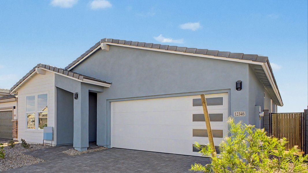 Front exterior of a new home in Teravalis, Buckeye, AZ, highlighting curb appeal (Image 22). Front exterior of a new home in Teravalis, Buckeye, AZ, highlighting curb appeal (Image 22).