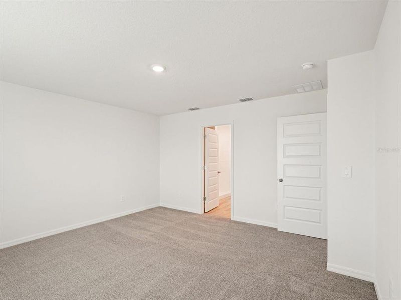 Spacious, unfurnished interior of a new home in Coasterra - Premier Series, Palmetto (Image 33).