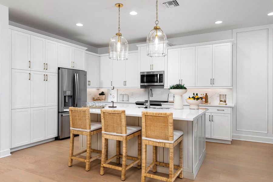 Representative furnished interior of a home built from the Eleuthera by GL Homes in Valencia Harbor (55+), Fort Myers (Image 6).