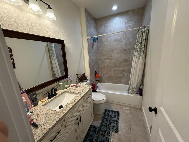 Full bath with vanity and shower / bathtub combination with curtain