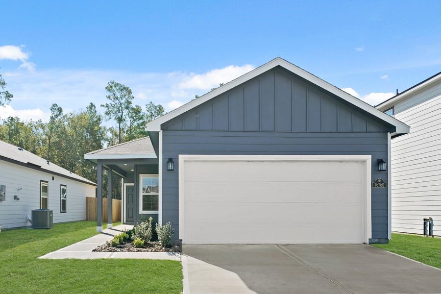 Front exterior of a new home in Maple Heights, Porter, TX, highlighting curb appeal (Image 1). Front exterior of a new home in Maple Heights, Porter, TX, highlighting curb appeal (Image 1).