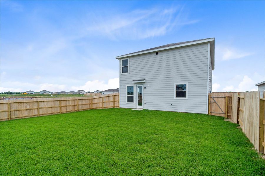 Expansive corner lot with massive backyard green space—a true blank slate ready for your dream pool, outdoor kitchen, or personal garden oasis.