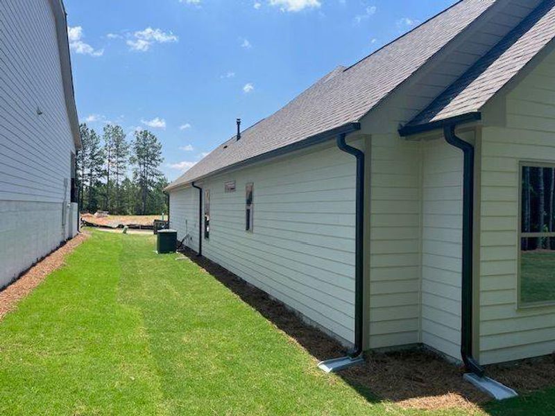 Front exterior of a new home in Soleil Belmont Park, Canton, GA, highlighting curb appeal (Image 25).