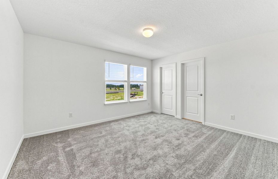 Spacious, unfurnished interior of a new home in Vida's Way, Wesley Chapel (Image 15).