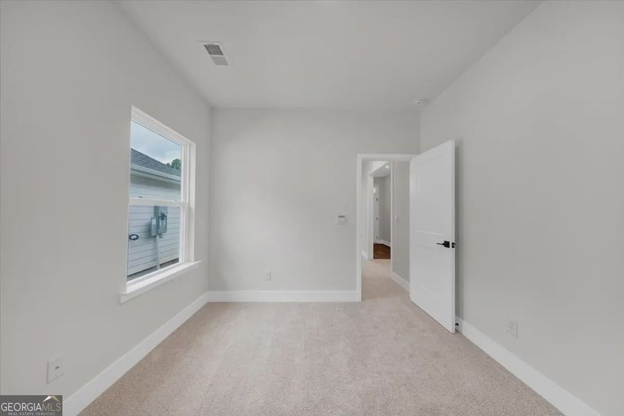 Spacious, unfurnished interior of a new home in Canterbury Villas, Carrollton (Image 29).