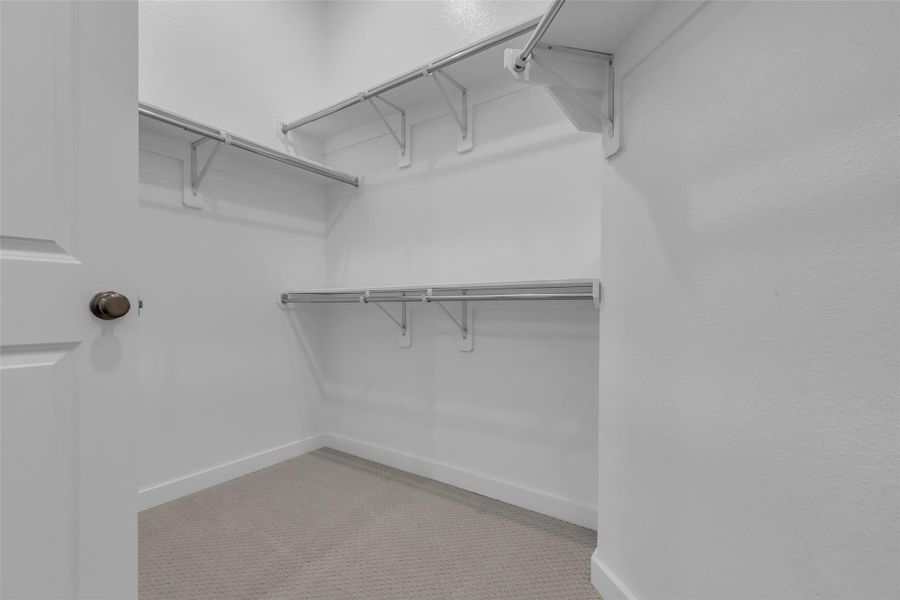The primary features a large walk-in closet.