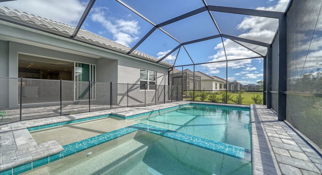 Exterior details and patio area of a home in Windward, Sarasota (Image 18).