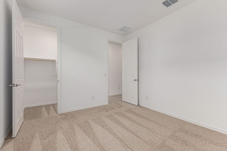 Spacious, unfurnished interior of a new home in Empire Pointe, Queen Creek (Image 12).