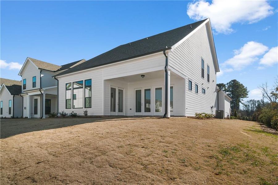 Exterior details and patio area of a home in Promenade at Sawnee Village, Cumming (Image 3).