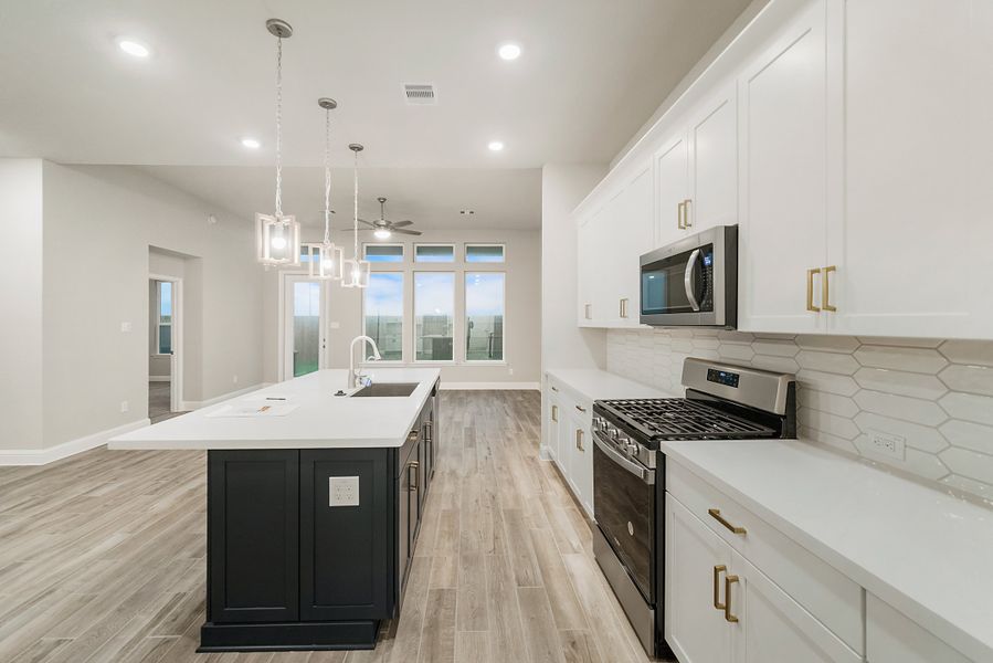 Representative furnished interior of a home built from the Bellissimo by Beazer Homes in Gatherings® at Chambers Creek: Signature Collection, Willis (Image 9). Representative furnished interior of a home built from the Bellissimo by Beazer Homes in Gatherings® at Chambers Creek: Signature Collection, Willis (Image 9).