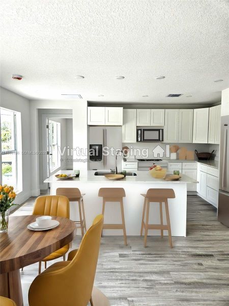 Kitchen/dining area-virtually staged