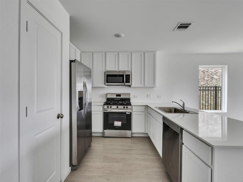 Furnished interior view inside a new home in , Katy (Image 11).
