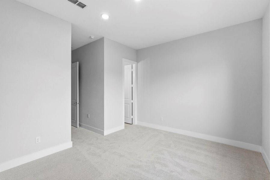 secondary bedroom on first floor with ensuite bathroom