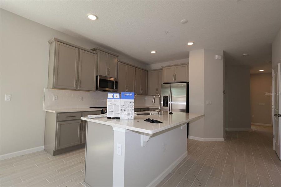 Furnished interior view inside a new home in Emerson Pointe, Apopka (Image 9). Furnished interior view inside a new home in Emerson Pointe, Apopka (Image 9).
