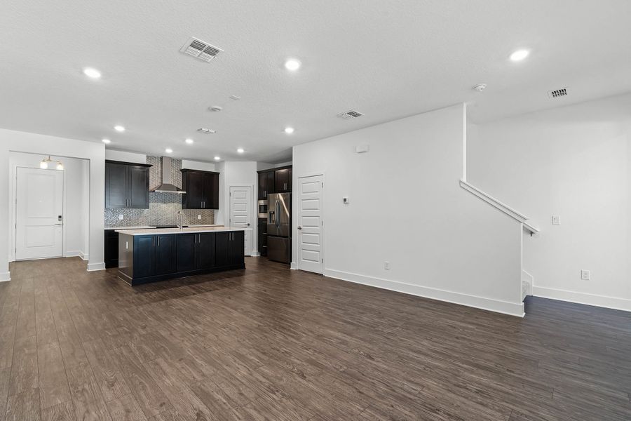 Spacious, unfurnished interior of a new home in Harvest at Ovation - Townhomes, Winter Garden (Image 11).