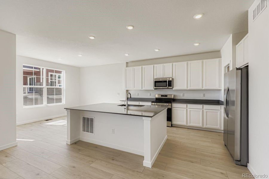 Furnished interior view inside a new home in Parterre: Paired Homes, Thornton (Image 5). Furnished interior view inside a new home in Parterre: Paired Homes, Thornton (Image 5).