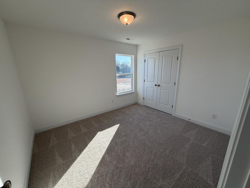 Spacious, unfurnished interior of a new home in Black Forest Pointe, Benson (Image 16).