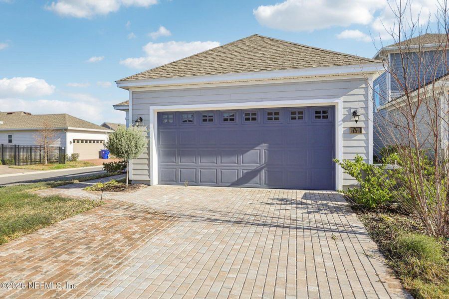 Front exterior of a new home in Brookside at Shearwater, St. Augustine, FL, highlighting curb appeal (Image 25).