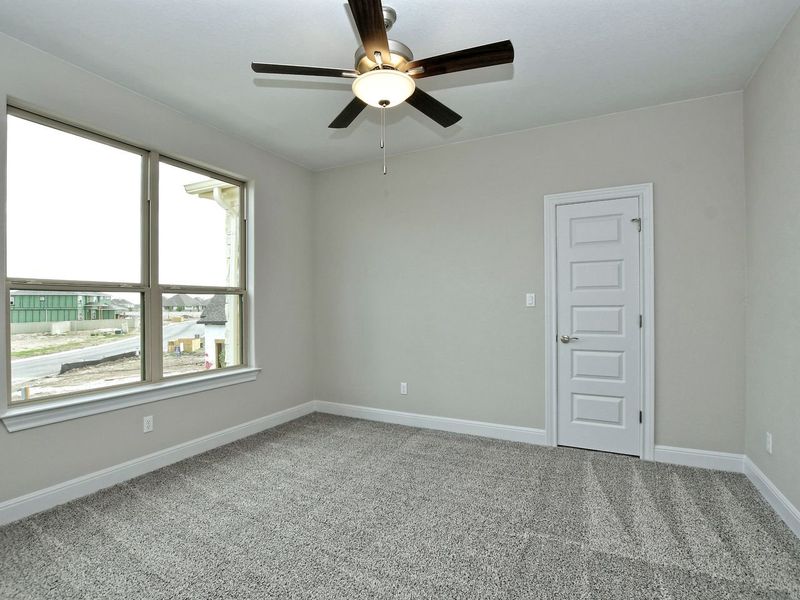 Representative unfurnished interior of a home built from the Madera II by Giddens Homes in Scofield Farms Estates, Georgetown (Image 385).