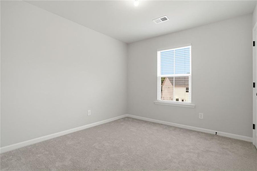 Spacious, unfurnished interior of a new home in Berkeley Mill, Cumming (Image 40).