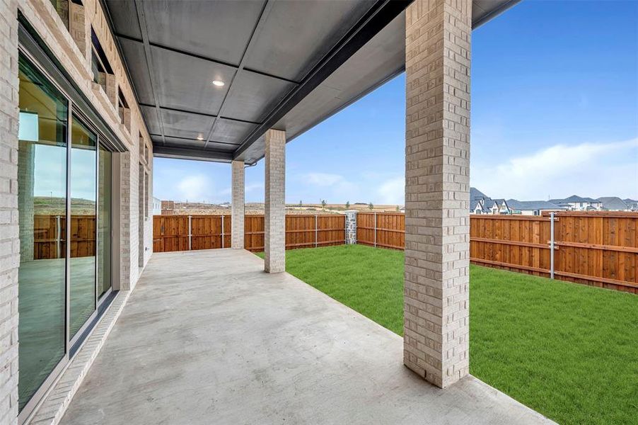 Exterior details and patio area of a home in Terraces – Estates, Rockwall (Image 3). Exterior details and patio area of a home in Terraces – Estates, Rockwall (Image 3).