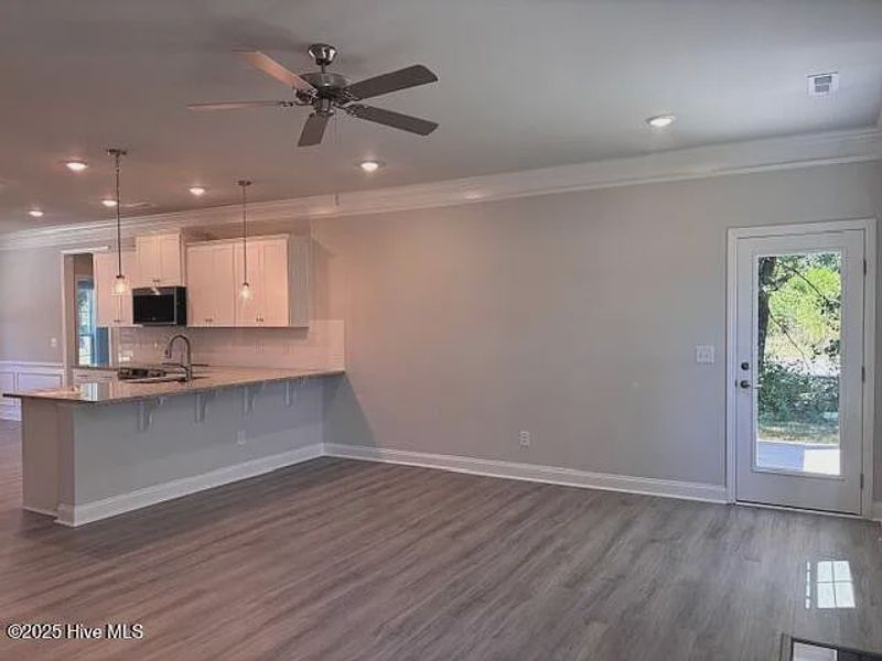 Spacious, unfurnished interior of a new home in River Village Square in River Landing, Wallace (Image 6).