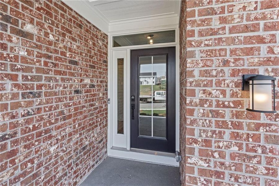 Exterior details and patio area of a home in Twin Lakes, Hoschton (Image 33).