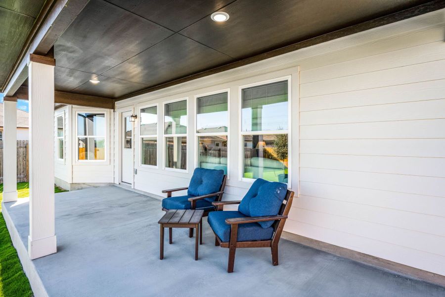 This is the back exterior of the Hawkins plan and is the model home in Carillon at 13305 Eppright Trace Blvd., Manor, TX. This is the back exterior of the Hawkins plan and is the model home in Carillon at 13305 Eppright Trace Blvd., Manor, TX.