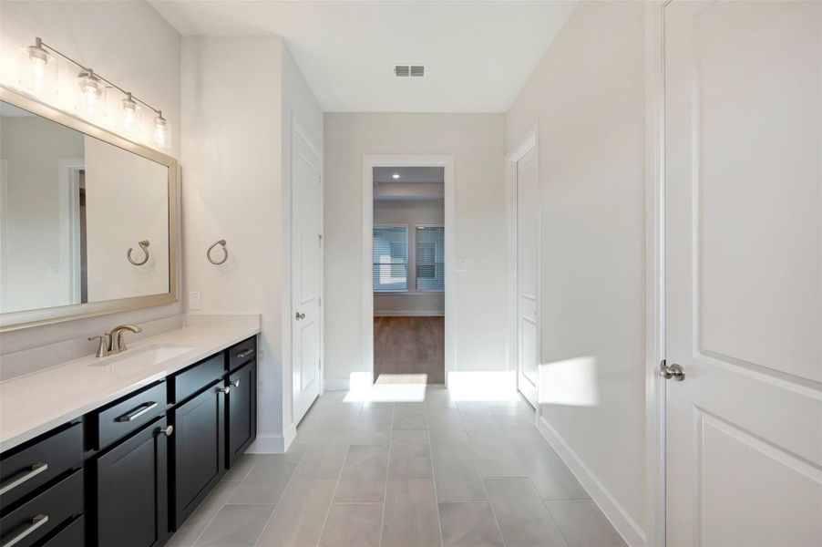 Furnished interior view inside a new home in Riceland - Enclave Row Collection, Mont Belvieu (Image 10).