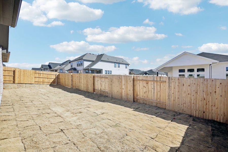 Exterior details and patio area of a home in Sunfield, Buda (Image 21).