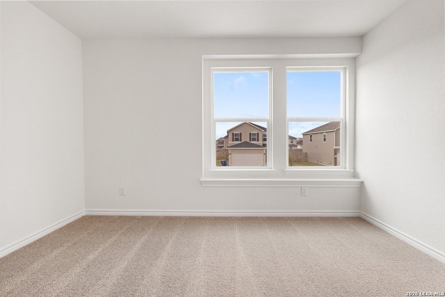 Spacious, unfurnished interior of a new home in Woodside Farms, Seguin (Image 26).