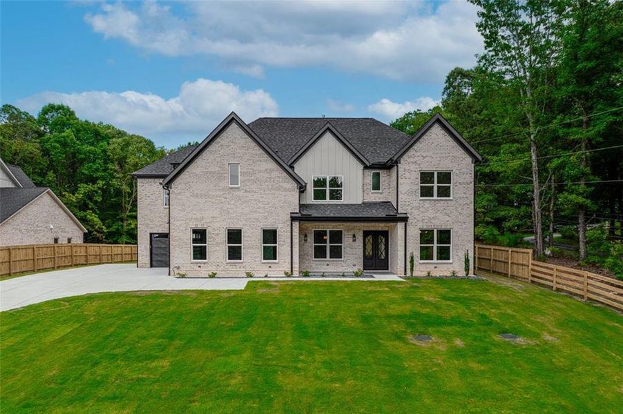 Front exterior of a new home in , Dacula, GA, highlighting curb appeal (Image 29).