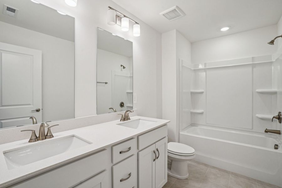 Furnished interior view inside a new home in Mansker Farms - Bronze Series, Hendersonville (Image 7).