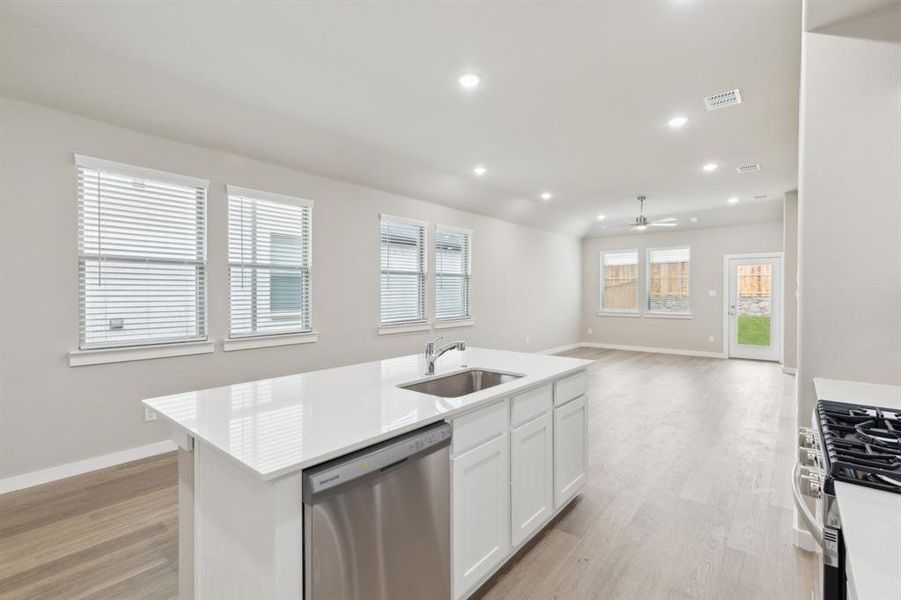 Kitchen in the Elm home plan by Trophy Signature Homes – REPRESENTATIVE PHOTO Kitchen in the Elm home plan by Trophy Signature Homes – REPRESENTATIVE PHOTO