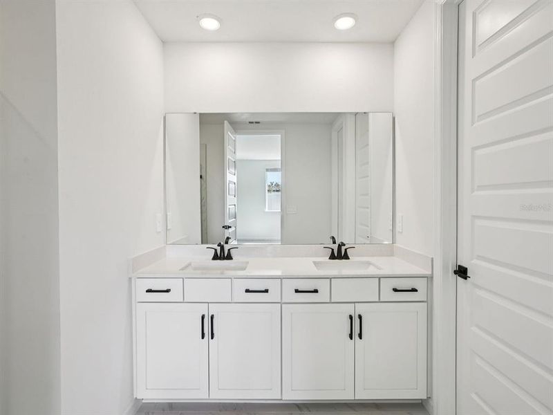 Furnished interior view inside a new home in Two Rivers - Signature Series, Zephyrhills (Image 6). Furnished interior view inside a new home in Two Rivers - Signature Series, Zephyrhills (Image 6).