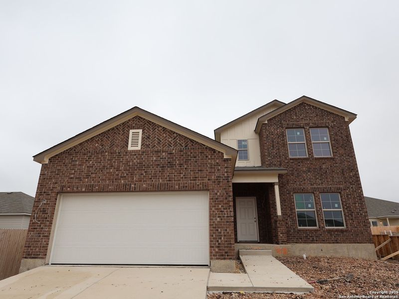 Front exterior of a new home in Paloma Park, Converse, TX, highlighting curb appeal (Image 16). Front exterior of a new home in Paloma Park, Converse, TX, highlighting curb appeal (Image 16).