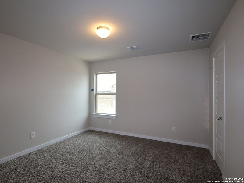 Spacious, unfurnished interior of a new home in Winding Brook, San Antonio (Image 18).
