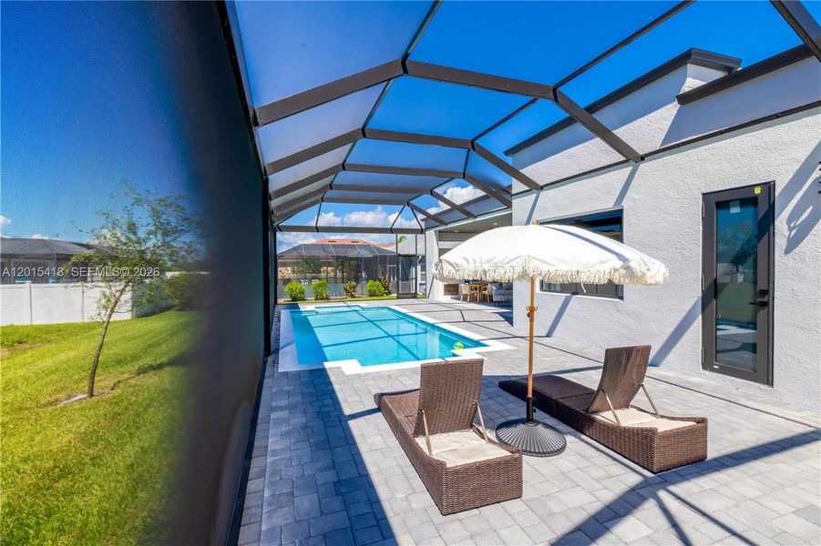 Exterior details and patio area of a home in , Cape Coral (Image 32).