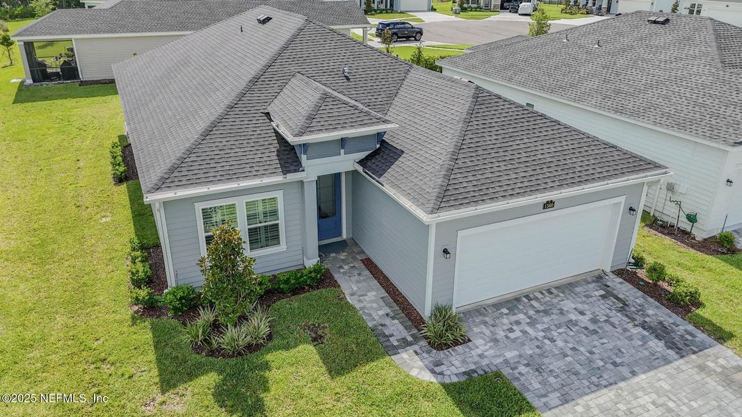 Front exterior of a new home in Stillwater | Active Adult 55+: Stillwater (50s) - Royal Collection, St. Johns, FL, highlighting curb appeal (Image 24). Front exterior of a new home in Stillwater | Active Adult 55+: Stillwater (50s) - Royal Collection, St. Johns, FL, highlighting curb appeal (Image 24).