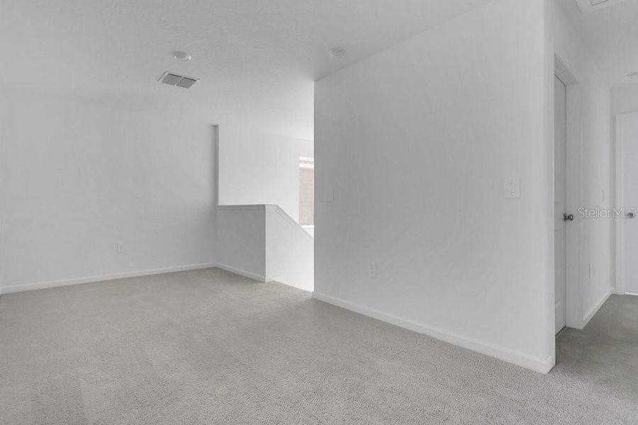 Spacious, unfurnished interior of a new home in Peace Creek Reserve, Winter Haven (Image 20).