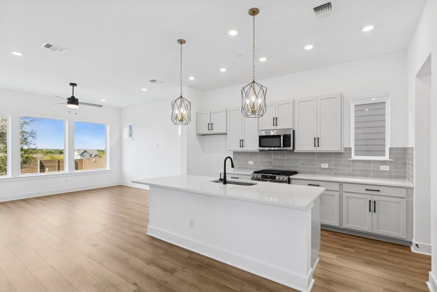 Furnished interior view inside a new home in Double Creek Crossing – City Home Series, Round Rock (Image 6). Furnished interior view inside a new home in Double Creek Crossing – City Home Series, Round Rock (Image 6).