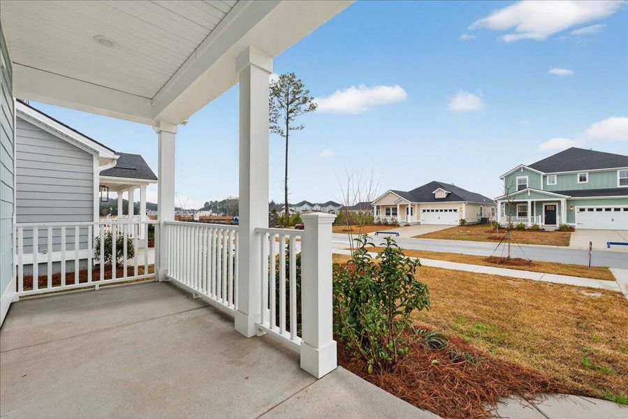 Exterior details and patio area of a home in The Coves at Lakes of Cane Bay, Summerville (Image 4).